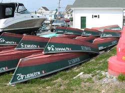 rental boats stacked along the shore of Barnegat Bay