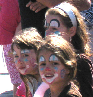 children with painted faces
