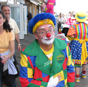 and more clowns walking on the boardwalk during clownfest